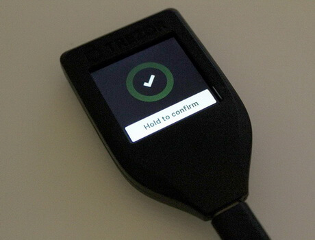 Hold to confirm on Trezor